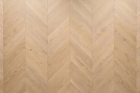 Chevron pattern oak flooring sample, mitred planks forming continuous V-shape