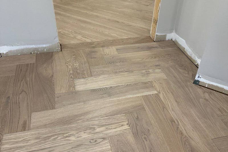 Herringbone 5×25", Mist Oak, Brampton hardwood flooring project by Floors Toronto