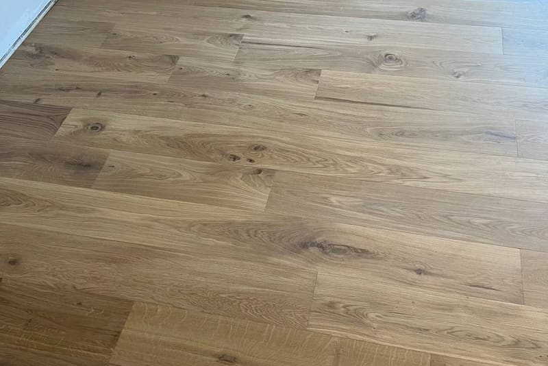 Chevron 5×25½" + plank, Grade AB, mixed installation — Vaughan hardwood flooring project by Floors Toronto (Warm Buff)